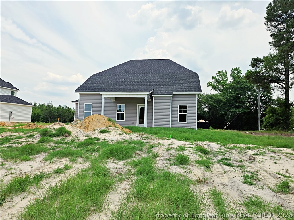 2678 Norrington Road Lillington, NC 27546 - Photo 28 of 31 a view of a house with yard and tree s