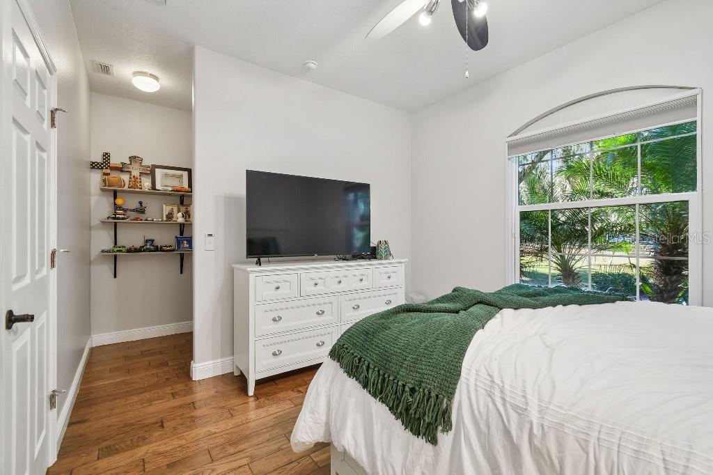 3302 Jap Tucker Road Plant City, FL 33566 - Photo 18 of 44 a bedroom with a bed and a flat screen tv