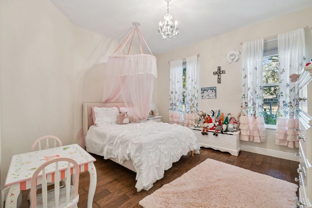 3302 Jap Tucker Road Plant City, FL 33566 - Photo 20 of 44 a bedroom with bed and a window