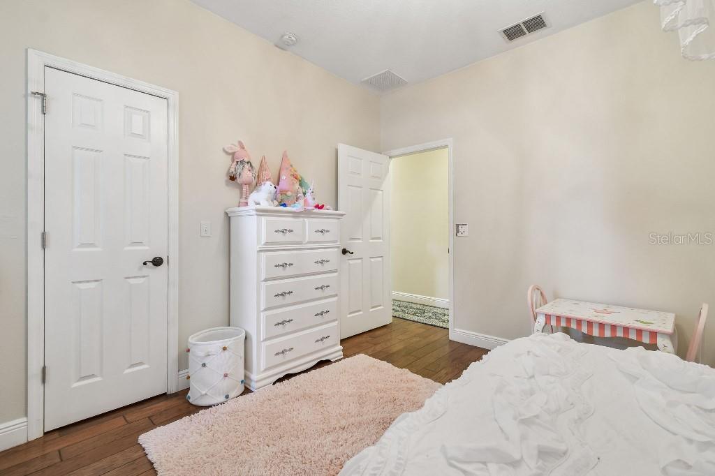 3302 Jap Tucker Road Plant City, FL 33566 - Photo 21 of 44 a bedroom with a bed and a window