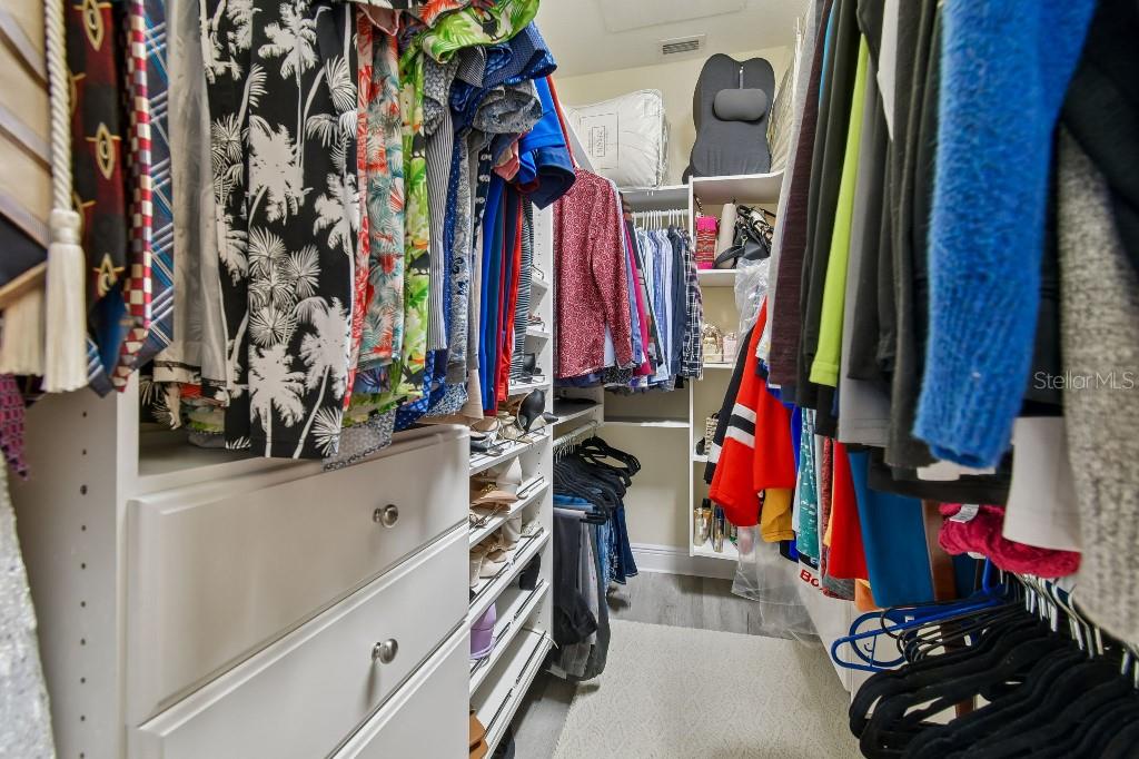 3302 Jap Tucker Road Plant City, FL 33566 - Photo 28 of 44 a view of walk in closet with clothes