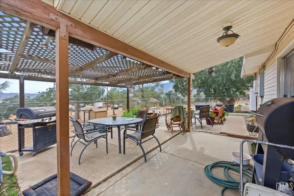 a outdoor living space with furniture and garden view