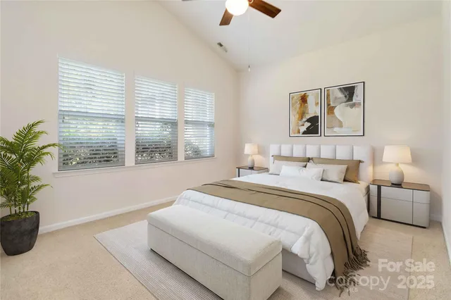 a bedroom with bed and a window