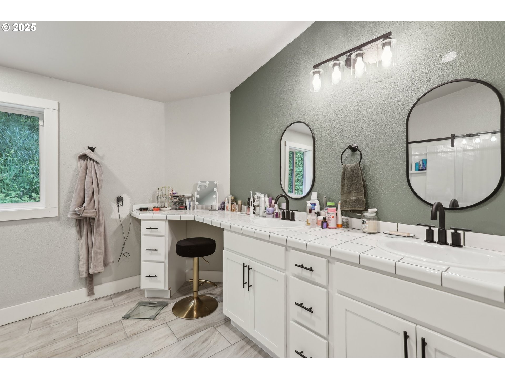 39585 Southwest Lasalle Road Gaston, OR 97119 - Photo 24 of 44 a bathroom with a double vanity sink and a mirror