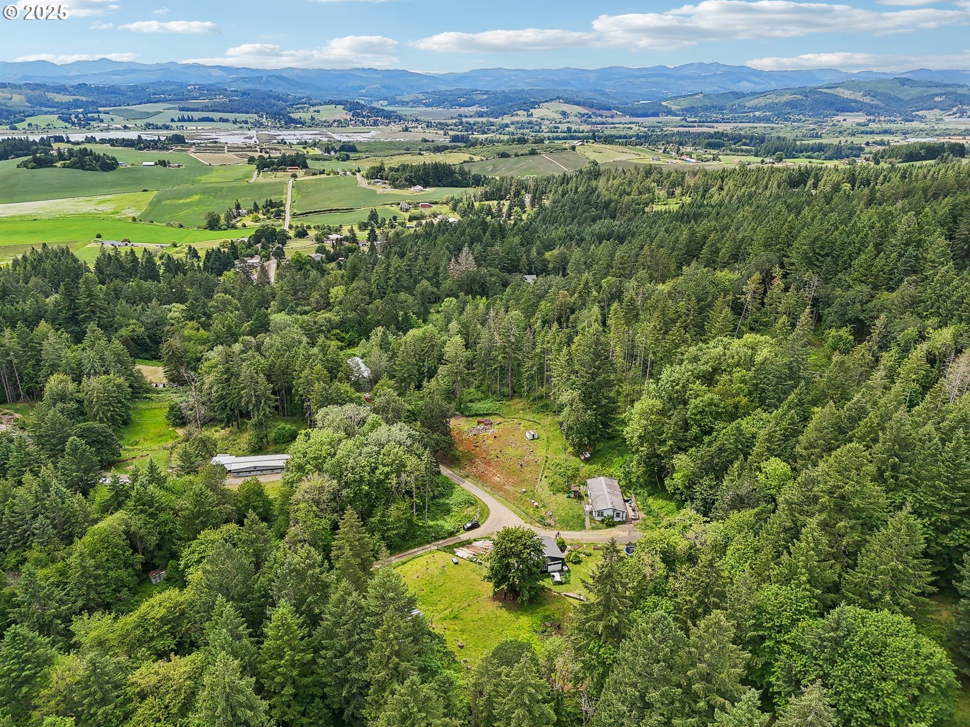 39585 Southwest Lasalle Road Gaston, OR 97119 - Photo 31 of 44 a view of a lake with a city