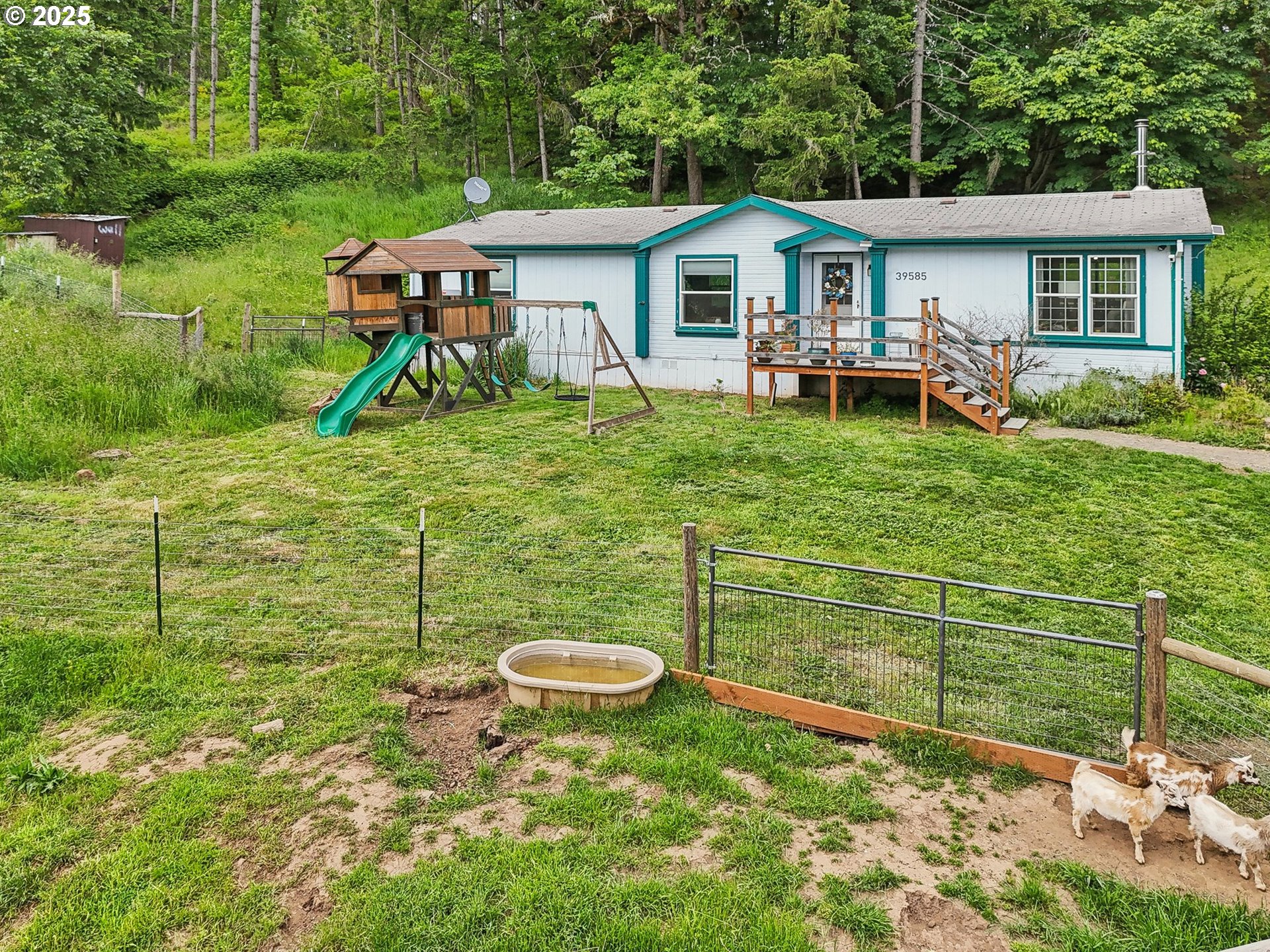 39585 Southwest Lasalle Road Gaston, OR 97119 - Photo 33 of 44 a view of a house with a backyard