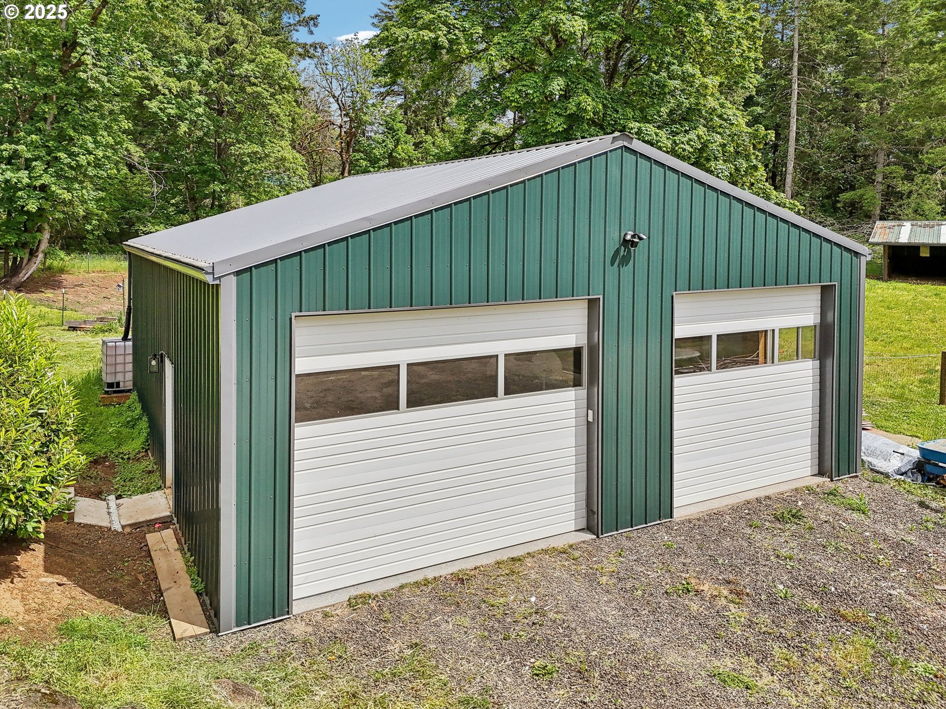 39585 Southwest Lasalle Road Gaston, OR 97119 - Photo 39 of 44 a view of a house with a yard