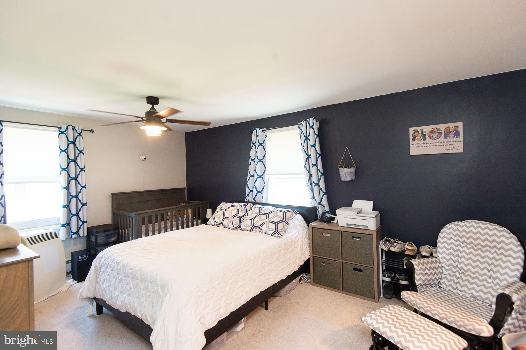 12 North Maple Avenue Ridgely, MD 21660 - Photo 21 of 30 a bedroom with a bed and window