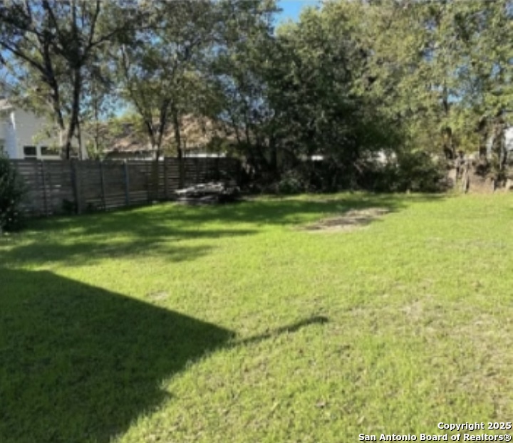 1414 Vargas Road Austin, TX 78741 - Photo 4 of 4 a view of a field of grass and trees
