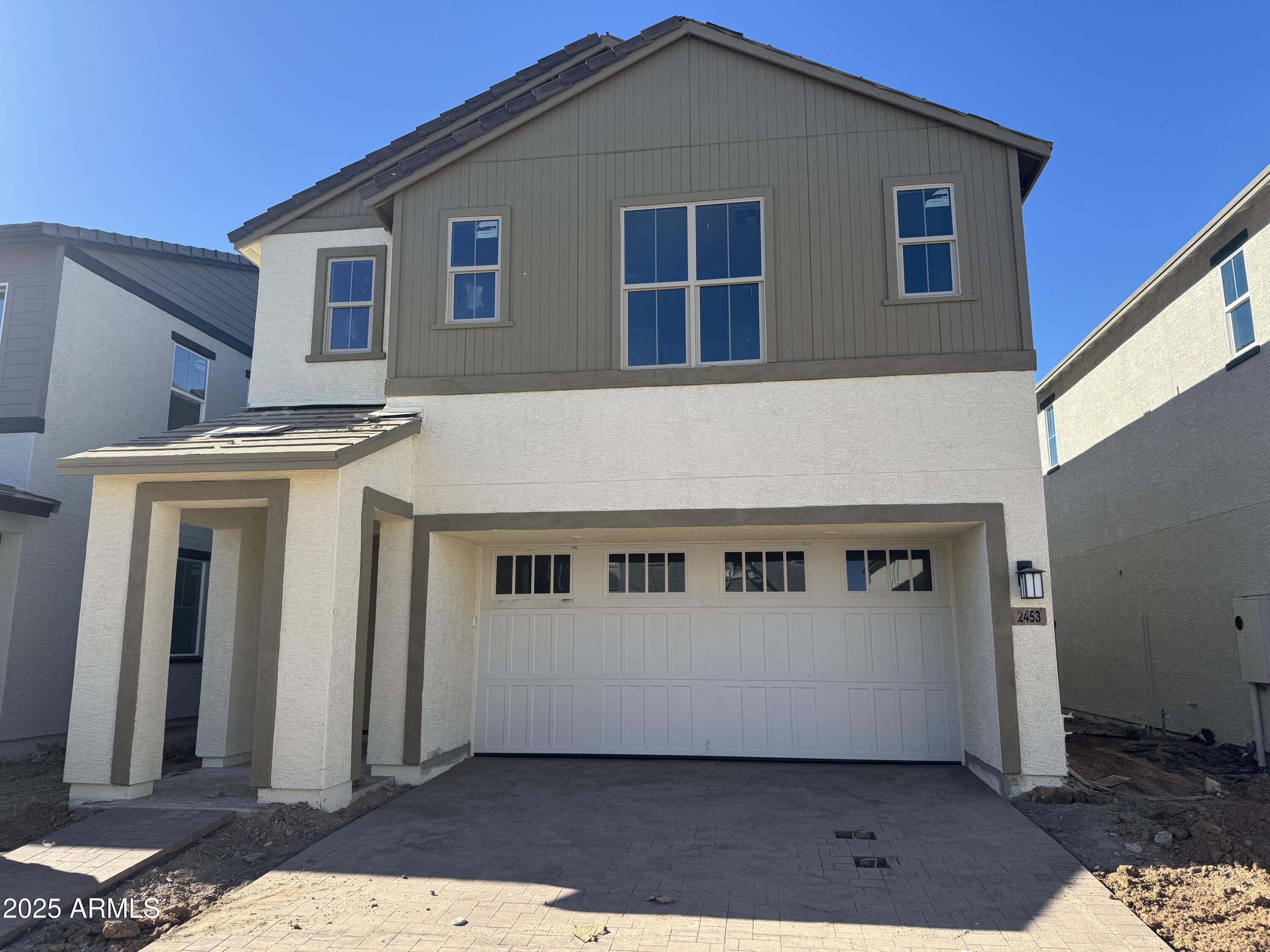 2453 West Maximo Way Phoenix, AZ 85085 - Photo 1 of 19 a view of a house with big yard and large tree