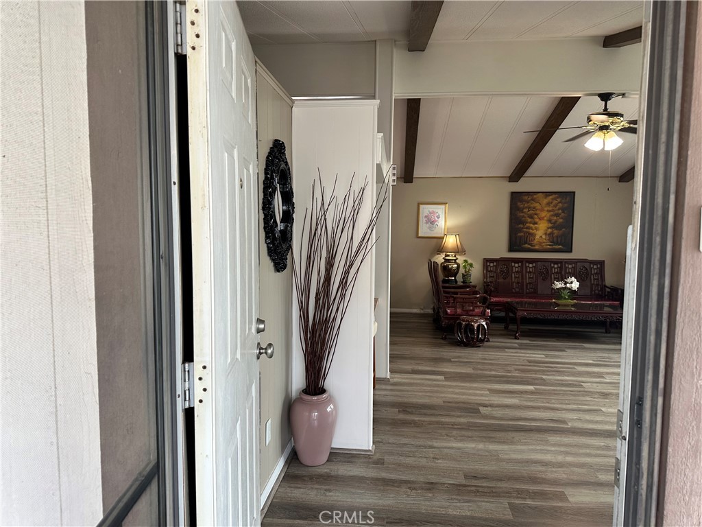 27701 Murrieta Road, Unit 268 Menifee, CA 92586 - Photo 12 of 24 a view of a livingroom with furniture and a livingroom