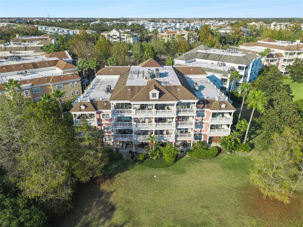 7656 Whisper Way, Unit 402 Reunion, FL 34747 - Photo 36 of 57 an aerial view of multiple house