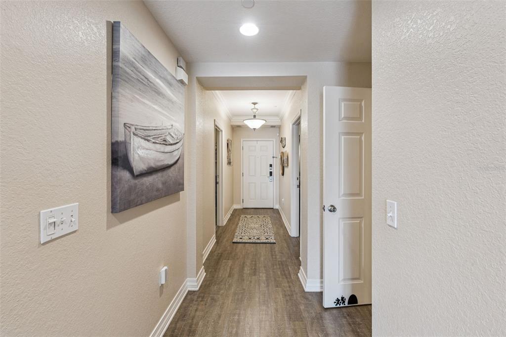 7656 Whisper Way, Unit 402 Reunion, FL 34747 - Photo 4 of 57 wooden floor in a gallery