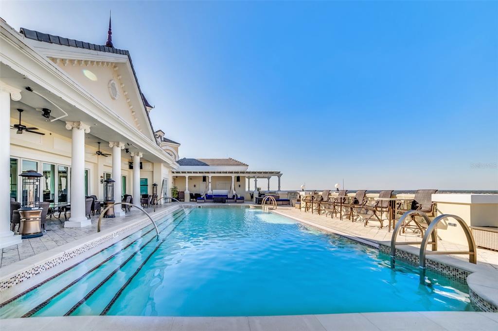 7656 Whisper Way, Unit 402 Reunion, FL 34747 - Photo 53 of 57 a living room with furniture and a table