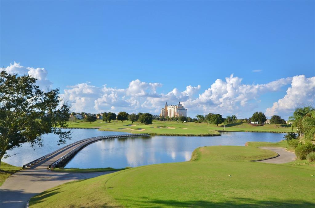 7656 Whisper Way, Unit 402 Reunion, FL 34747 - Photo 54 of 57 a view of a lake with houses in the back