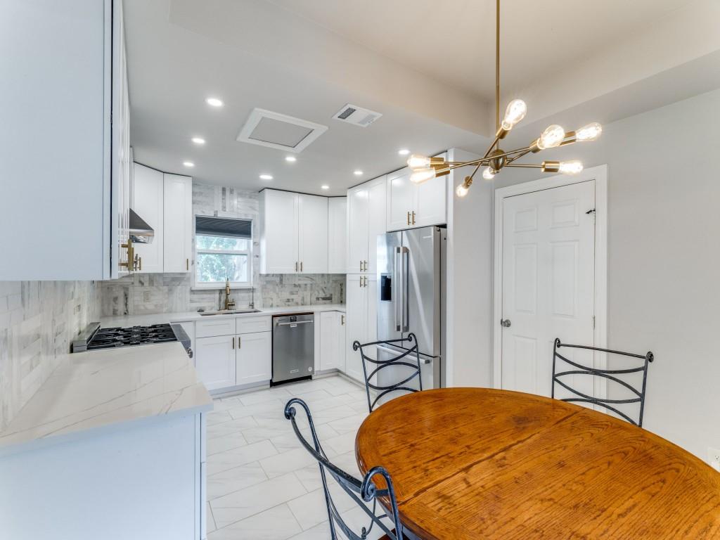 2001 Pebblebrook Trail Irving, TX 75060 - Photo 15 of 28 a view of a kitchen with a sink and cabinets