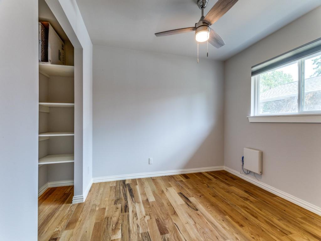 2001 Pebblebrook Trail Irving, TX 75060 - Photo 5 of 28 a view of empty room with wooden floor and fan
