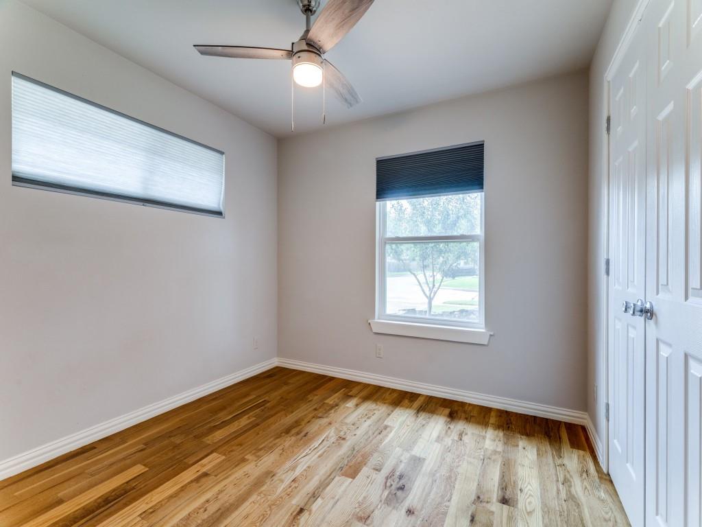 2001 Pebblebrook Trail Irving, TX 75060 - Photo 6 of 28 a view of an empty room with wooden floor and a window