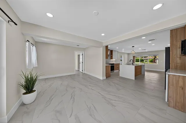 a bathroom with a toilet sink and shower