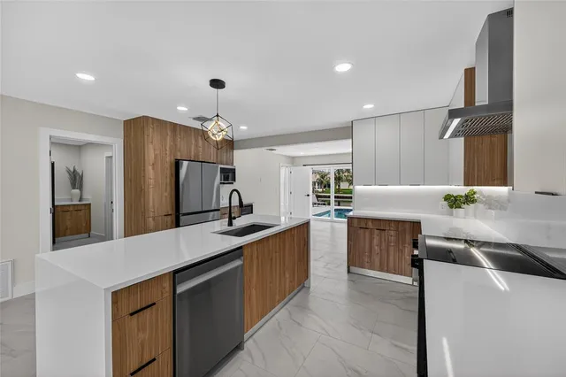 a view of a chairs and table in patio