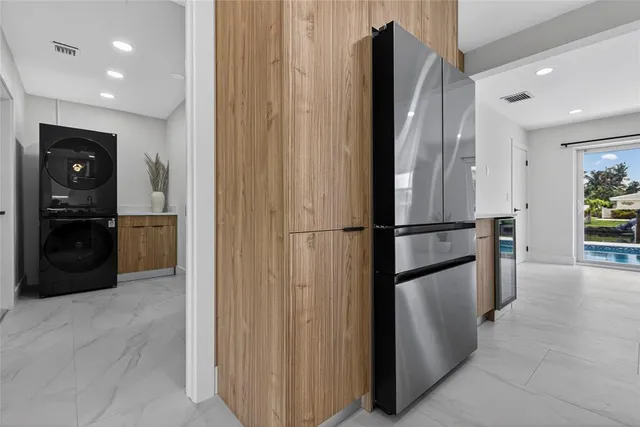 a front view of a house with outdoor seating