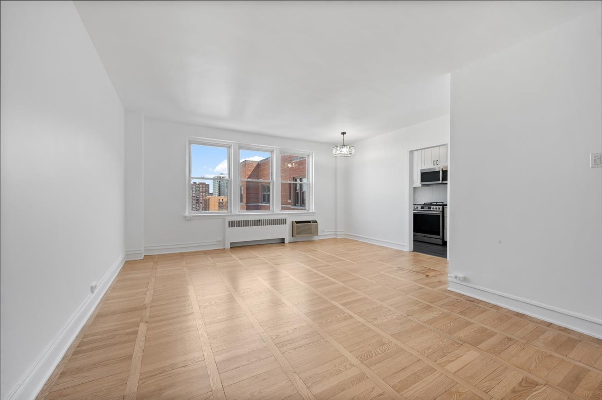 1585 Ridge Avenue, Unit 705 Evanston, IL 60201 - Photo 8 of 26 a view of an empty room with a window