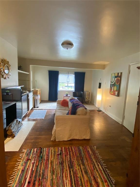 3235 Parkview Avenue Pittsburgh, PA 15213 - Photo 5 of 21 a bed room with a bed and a view of kitchen