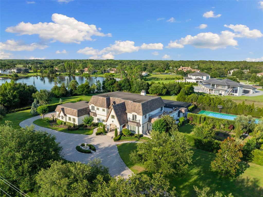 an aerial view of a house with a garden
