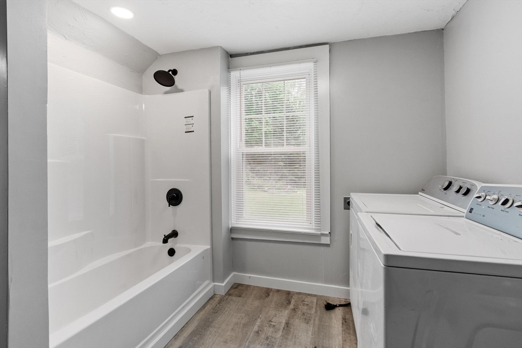 258 Allen Road Ashby, MA 01431 - Photo 19 of 36 a bathroom with a bathtub sink and vanity