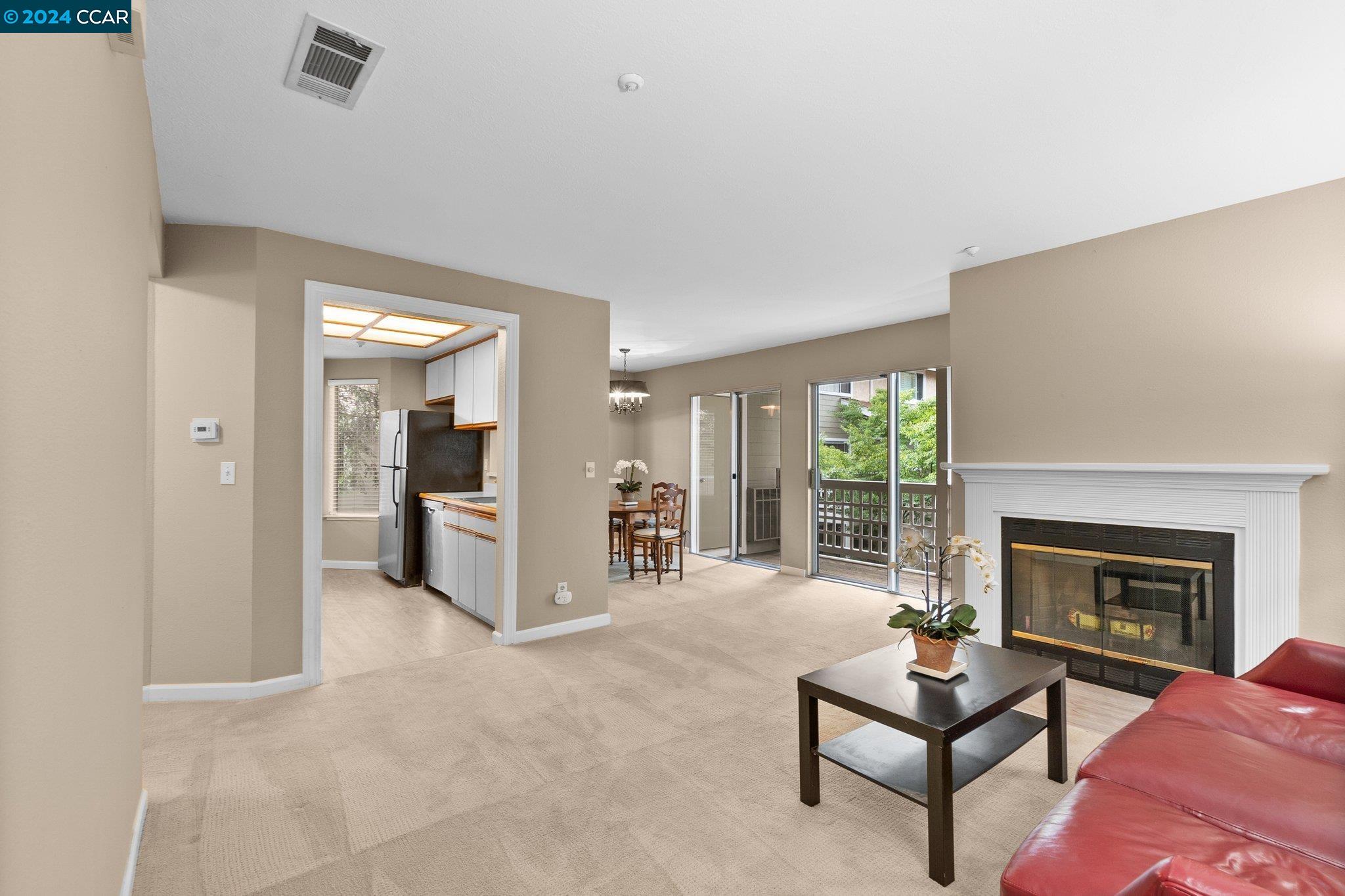 2675 Oak Road, Unit E Walnut Creek, CA 94597 - Photo 1 of 1 a living room with furniture and a fireplace