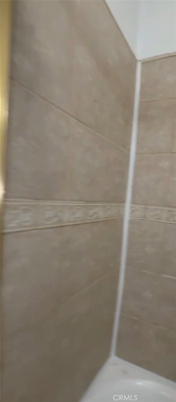 20234 Cantara Street Winnetka, CA 91306 - Photo 5 of 7 a bathroom with a shower