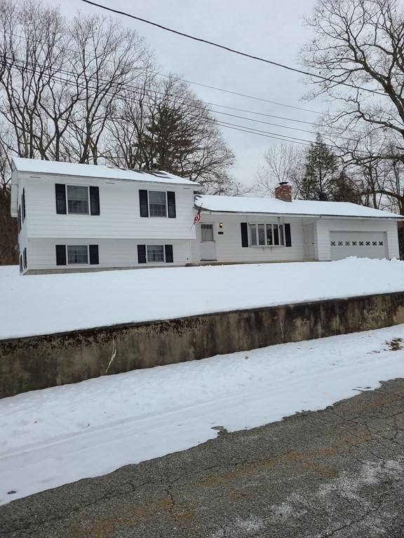65 Lakeview Avenue Athol, MA 01331 - Photo 1 of 30 a front view of a house with a yard