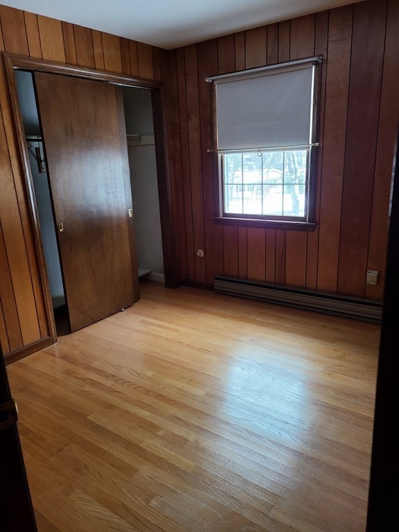 65 Lakeview Avenue Athol, MA 01331 - Photo 20 of 30 a view of an empty room with wooden floor and a window