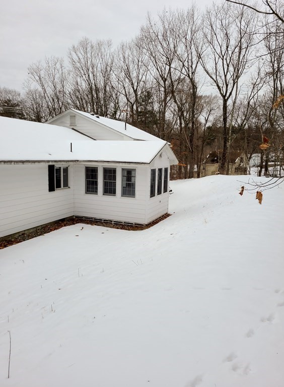 65 Lakeview Avenue Athol, MA 01331 - Photo 4 of 30 a view of house with snow on the road