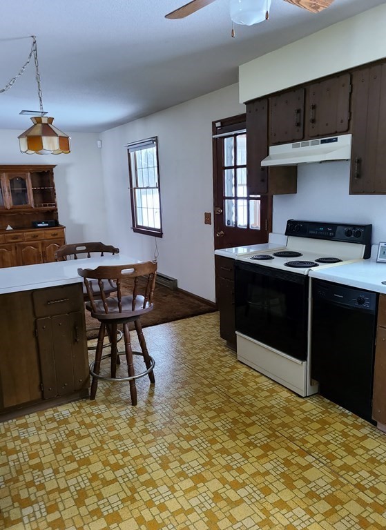 65 Lakeview Avenue Athol, MA 01331 - Photo 5 of 30 a kitchen with stainless steel appliances granite countertop a stove and a refrigerator