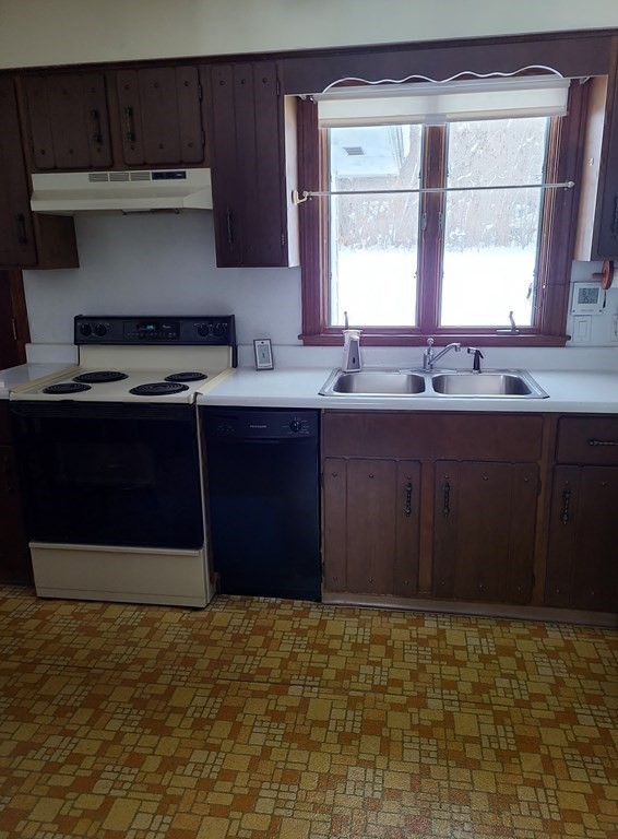 65 Lakeview Avenue Athol, MA 01331 - Photo 6 of 30 a kitchen with stainless steel appliances granite countertop a stove a refrigerator and a sink