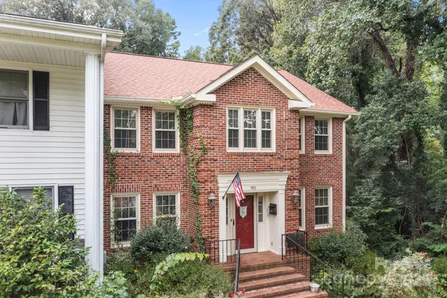 a front view of a house with yard