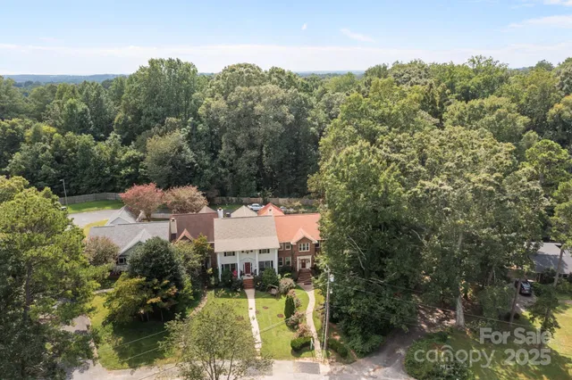 a view of a town with mountains in the background