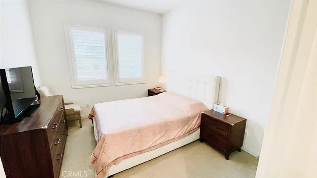 a view of house with garden and entertaining space