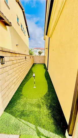 a view of a garden with a building