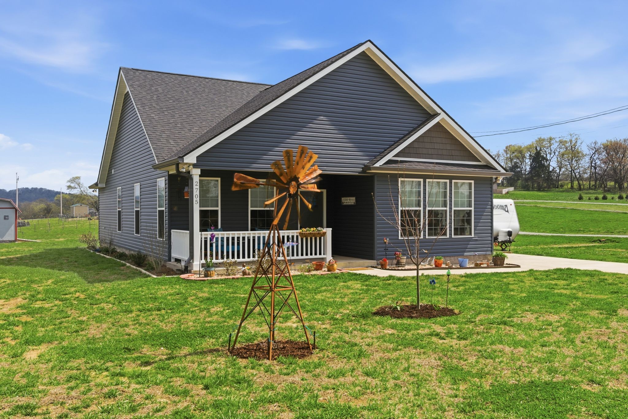 2705 Mc Connell Road Cornersville, TN 37047 - Photo 8 of 41 a view of a house with a yard