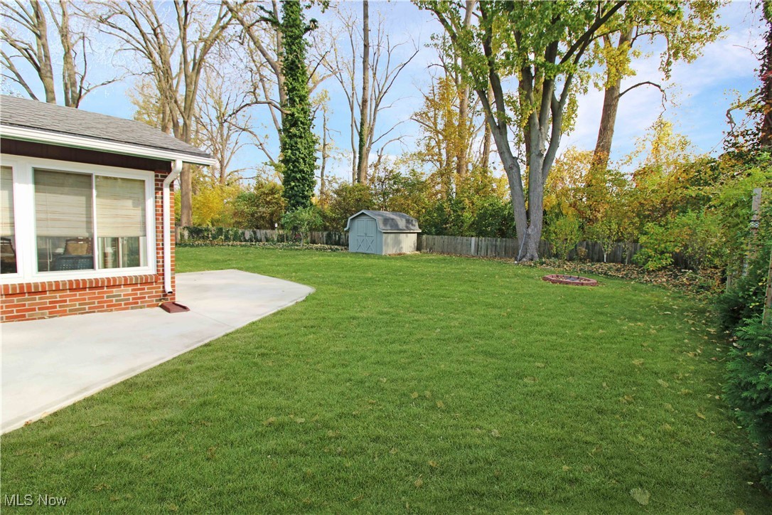 2708 East Sand Road Port Clinton, OH 43452 - Photo 31 of 33 View of yard with a patio area and a storage unit