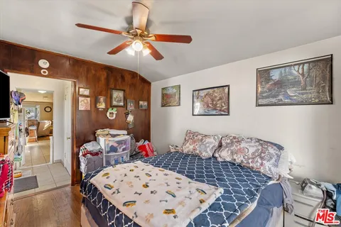 a view of a big room with wooden stairs