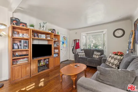 a kitchen with a stove and cabinets