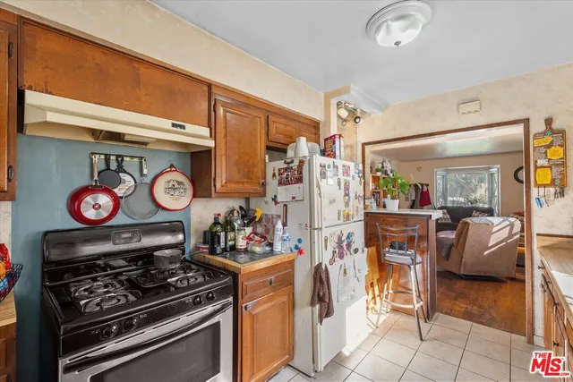 a bedroom with a bed and a closet