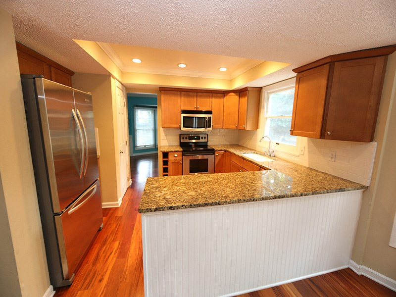 4328 Hickory Ridge Drive Raleigh, NC 27609 - Photo 3 of 16 Updated kitchen with stainless steel appliances and granite counter tops Kitchen
