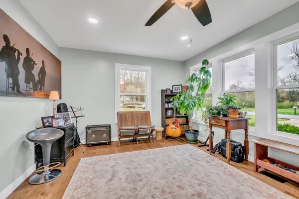 a living room with furniture and a window