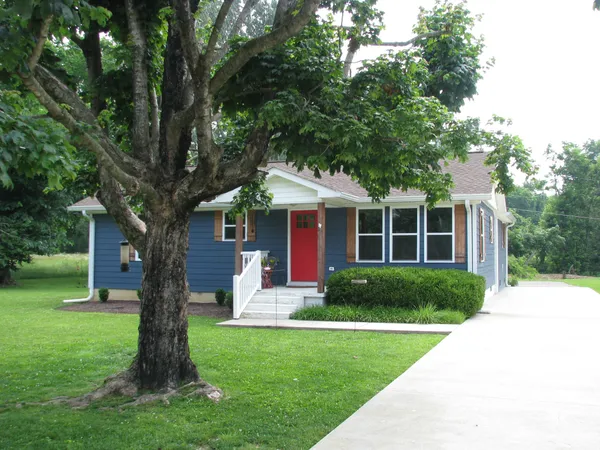 a view of outdoor space yard and front view of a house