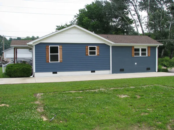 a view of a yard and from a window