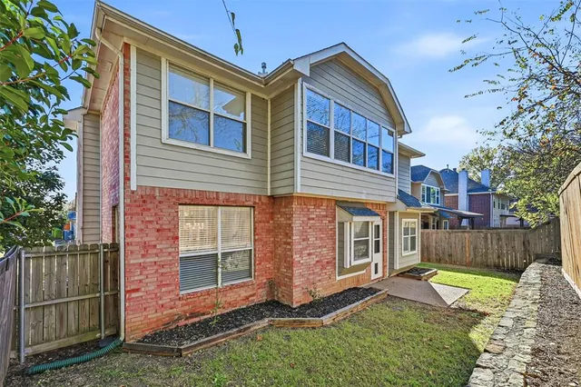 a view of outdoor space yard and front view of a house